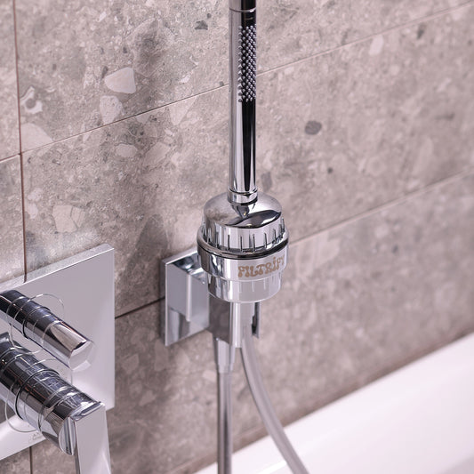 Filtrify chrome shower filter installed on shower hose | variant:chrome